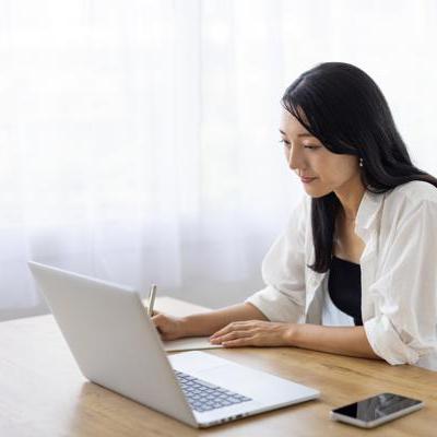 woman learning on laptop